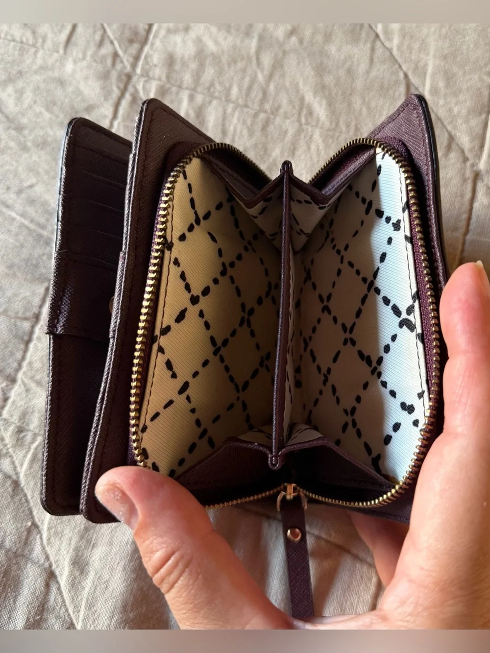 kate spade plum zip-around wallet with gold plaque